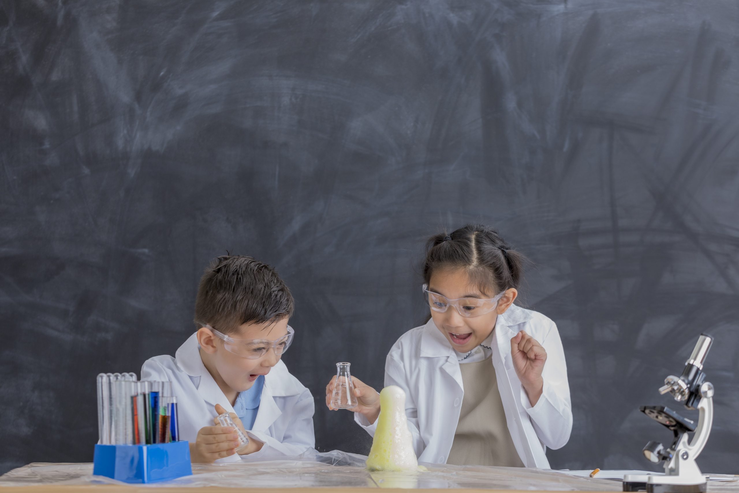 Children conducting a science experiment in a classroom laboratory